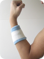 2 colored sky blue and white wristbands on arm for sweat