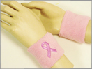 pink sweatband with cancer awareness ribbon