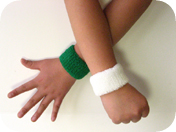 children's green and white wristband wearing view