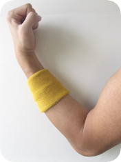 athletic sweat wrist band in gold